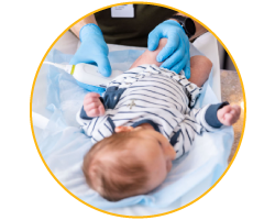 Baby being tested for hip dysplasia