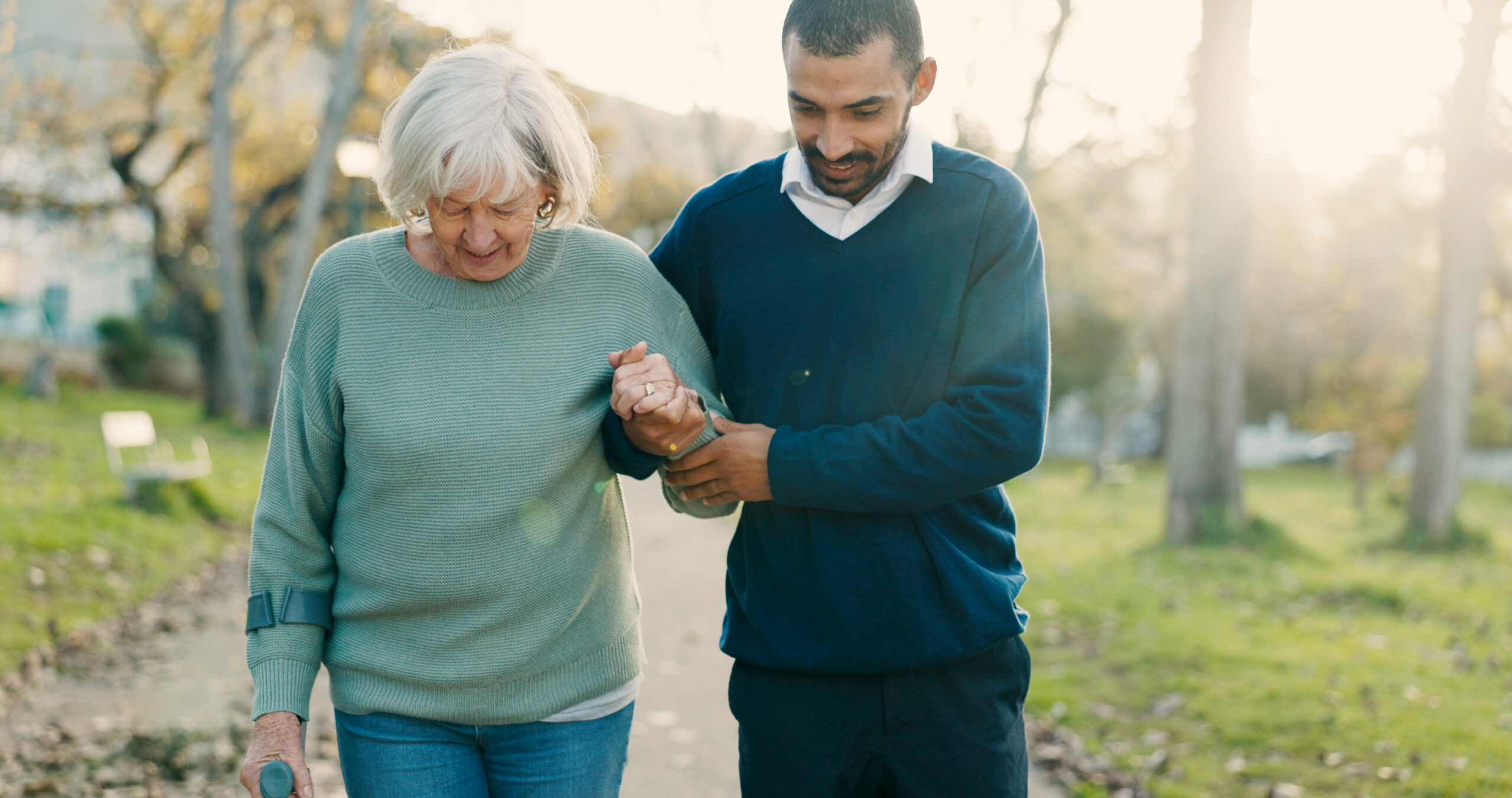 senior woman walking with support