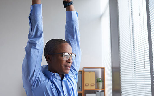 Man doing arm exercises for arthritis